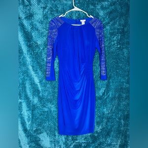 Short blue dress with bedazzled shoulders